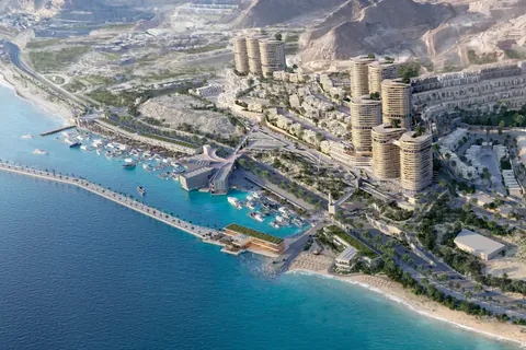 Aerial rendering of the marina, breakwater and towers along the coast