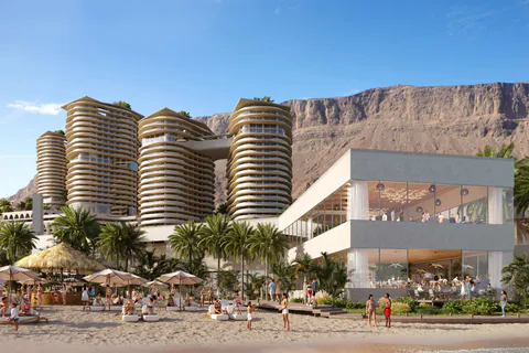 Rendering of the beach club with sun loungers and umbrellas, towers behind